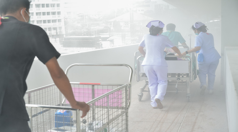 people evacuating a hospital in a fire